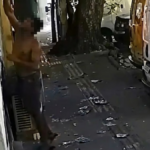 imagem de câmera de segurança mostrando pessoa tentando roubar aparelho de ar-condicionado