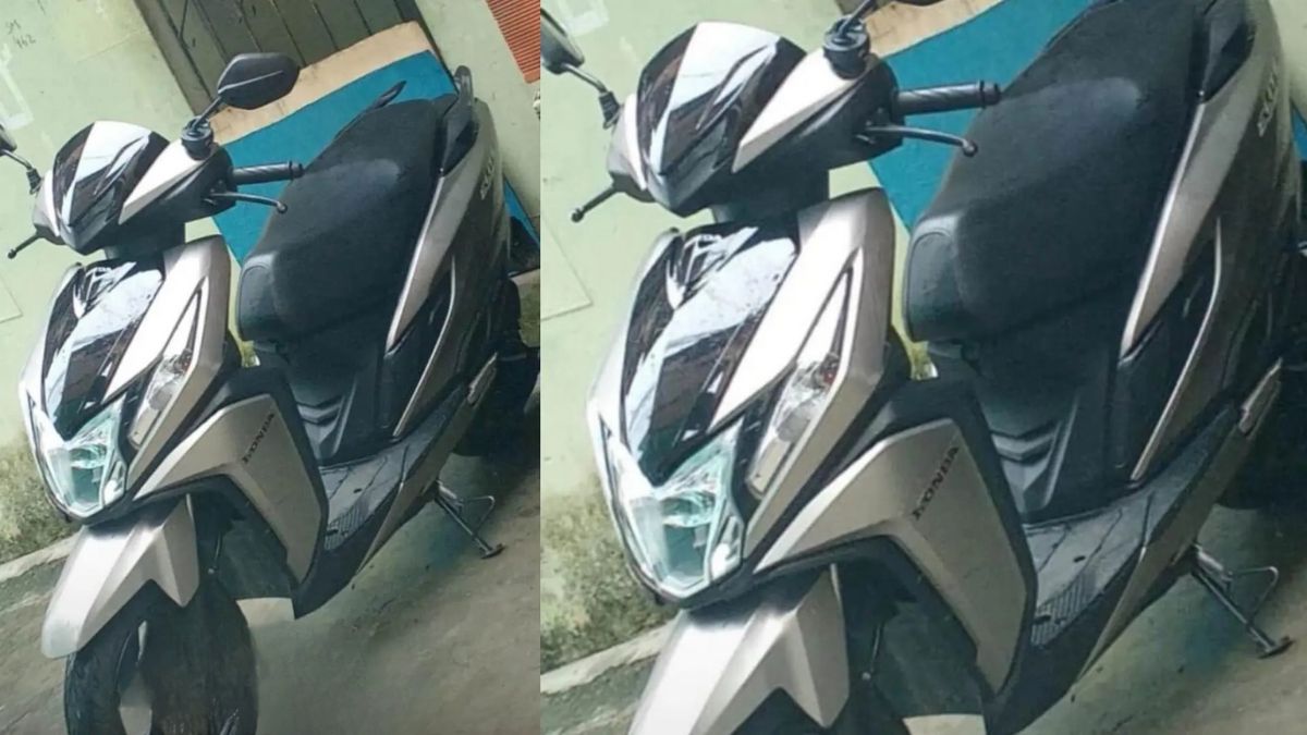 moto Honda Elite prata.